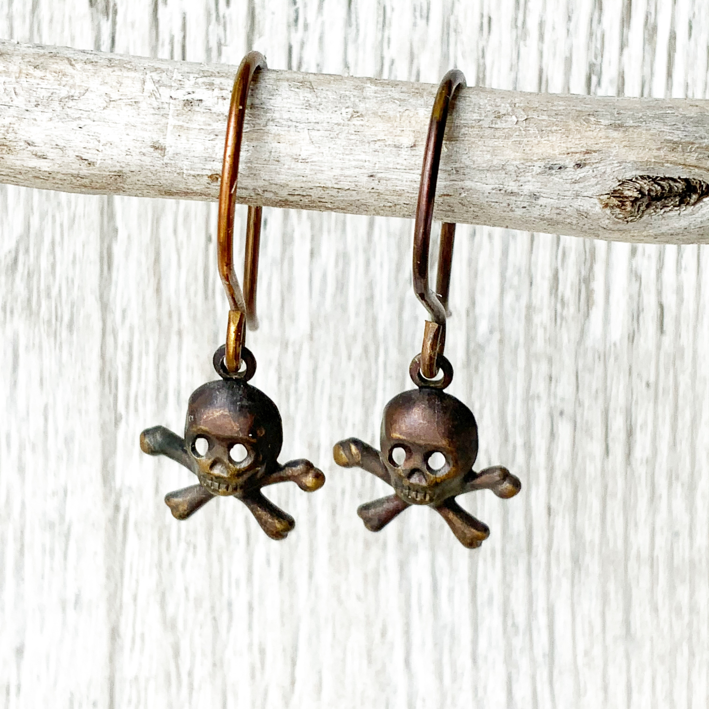 Tiny Skulls Brass Earrings with Handmade French hooks, Patina’d Charms Little Antiqued Brass Skull